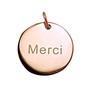 Pendentif acier rose ZAG plaque ronde gravée "Merci"