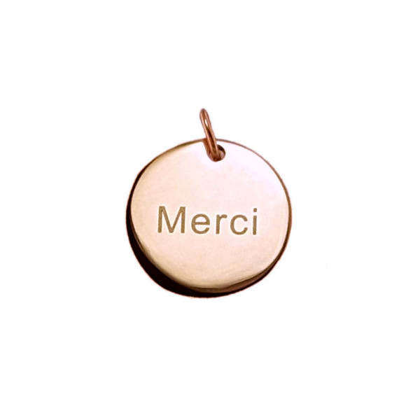 Pendentif acier rose ZAG plaque ronde gravée "Merci"