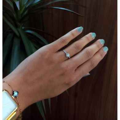 Bague femme Or blanc entourage diamants 0,35 carats